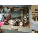 A box of metalwares including white metal sugar scoop,