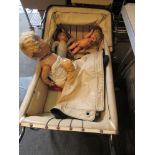 A vintage pram together with a collection of dolls