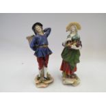 A pair of continental porcelain figures of man and woman, cross mark to base, 1128,