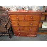 A Victorian mahogany round cornered chest of two short over three long drawers, bun handles,