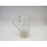 A 19th Century coin tankard with trailed bands to the rim,