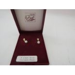 A pair of cultured pearl 9ct gold drop earrings