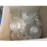 A box containing assorted cut glass items including bowls, drinking glasses etc.