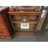 A Victorian mahogany three tier bookcase,