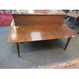 A 1960's oak coffee table with splayed legs,