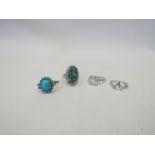 An Egyptian turquoise and white topaz ring, size O,