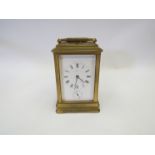 An early 20th Century French brass carriage clock with strike repeater and alarm,