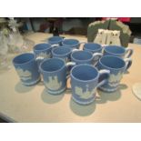 Eleven Wedgwood blue Jasperware Christmas mugs dating from 1971-1981