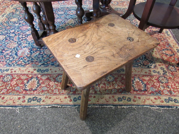 A Victorian revolving seat stool on fluted stem