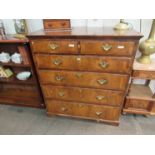 A circa 1760 and later walnut and crossbanded yew chest of two over four graduating drawers,