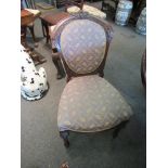 A set of six carved dining chairs with melon fluted front legs