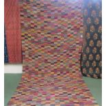 A possibly early 20th Century extremely large African Kente cloth hanging,