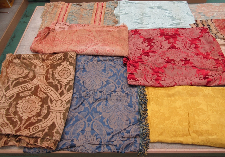 A good quantity of 18th, 19th and early 20th Century silks, woven textiles,