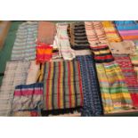 A great number of exquisite assorted stripe mainly silk fabrics to include a variety of ethnic
