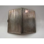 A silver engine turned card case,