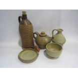 Five pieces of studio pottery domestic wares including Morris wine flagon, a teapot etc,