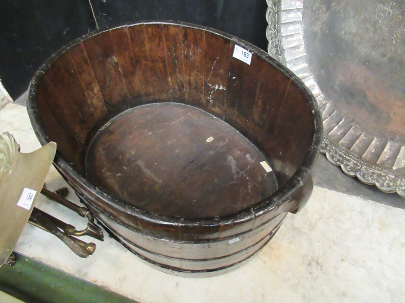 An oak and metal banded ice bucket,