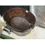An oak and metal banded ice bucket,
