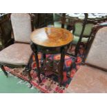 A French 18th Century revival marquetry inlaid circular top lamp table with decorative brass ormolu