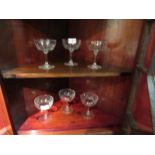 A set of six crystal glass champagne saucers