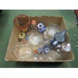 A selection of mostly decorative glassware including lidded jars, decanters,