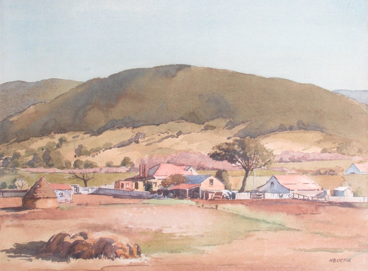 HARRY BUCKIE (Australian 1897-1982): A framed and glazed watercolour, Australian valley farm scene.