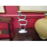 A pair of modernistic candlesticks,