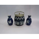 A Wedgwood lidded biscuit barrel and a pair of side vases