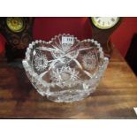 A crystal glass bowl with wavy edge,