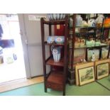 A Victorian mahogany single drawer three tier stand,