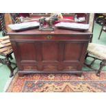 Circa 1800 a three panel oak mule chest with internal lidded candle/taper box over a single long