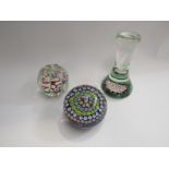 Three millefiori paperweights