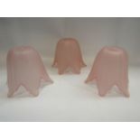 Three 20th Century floral form frosted pink glass lamp shades