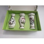 A boxed set of three Portmeirion vases