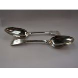 A pair of Georgian silver serving spoons,
