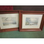 A pair of prints by Roland Green depicting ducks in flight, oak framed,