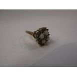 A lady's opal and emerald gem set ring, shanked unmarked. Size N, 4.