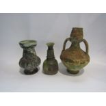 Two antique style pottery jugs and a Roman style bottle