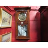 An early 20th Century wall clock with two train movement,