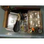 A box of miscellaneous items including a plated ink stand, Dunhill lighter, pen knives,