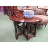 An 18th Century style oak gate-leg occasional table,