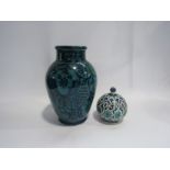 A Middle-Eastern Iznik vase in turquoise and a lidded pot (2)
