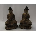A pair of Eastern gilt bronze deities seated on platforms,