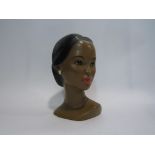 A Marwal resin bust of Asian lady, marked to back,