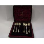 A cased set of six silver Elkington and Co silver teaspoons with tri-form finials,