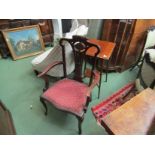 A pair of mahogany dining chairs with shaped crests with a matching carver chair (3)