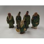 Five early 20th Century Chinese pottery figures