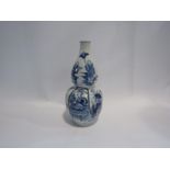 A 19th Century blue and white Oriental gourd vase with four character mark to base.