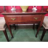 A circa 1760 pegged oak lowboy the single frieze drawer over pad foot straight cabriole legs,
