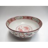 A 19th Century Oriental porcelain bowl with hand-painted floral frieze blossoming tree design,